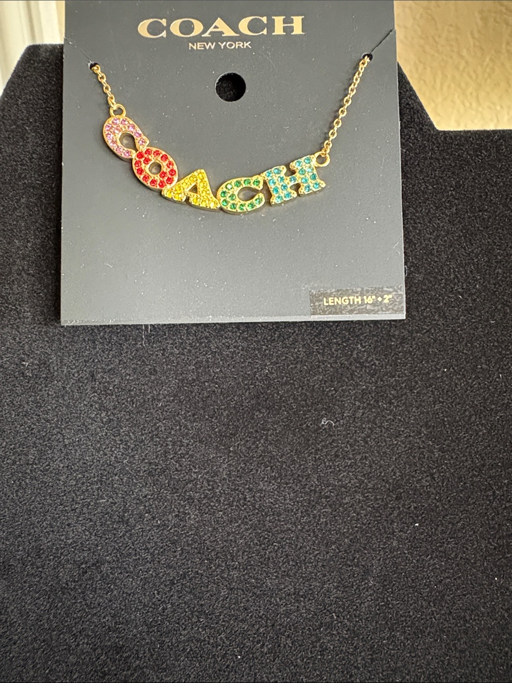COACH Gold-Tone Multicolor Crystal Logo Necklace